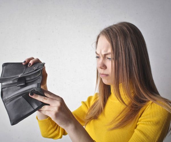 Woman Holding Black Wallet